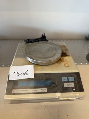 an image of a scale with a price tag on it