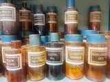many jars of food that are sitting on a shelf