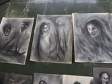 several drawings of a woman with long hair and a man with a beard