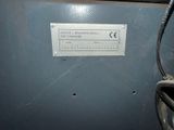 a sign on the side of a machine that says the changer