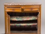 an old wooden cabinet with a marble top and drawers