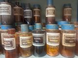 many jars of food that are sitting on a shelf