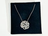 sterling silver plated monogram necklace on black velvet box