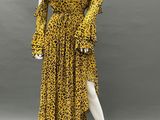 a yellow leopard print dress on a mannequin mannequin mannequin mannequin mannequin mannequin mannequin mannequin mann