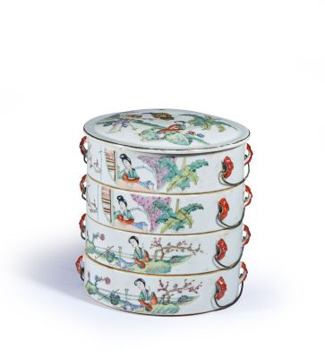 a white container with a design of birds and flowers