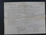 an old document with writing on it sitting on a table