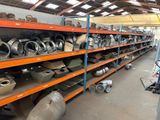 many different types of exhaust pipes on the shelves
