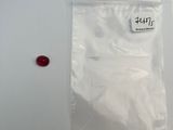 a bag of white powder sitting on a table