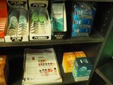 a lot of boxes of toothbrushes on the shelf