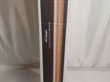 an open box of chopsticks sitting on top of a table