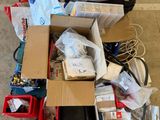 a pile of boxes and other items sitting on the floor