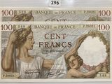 une image représentant un billet de banque sur lequel figure une femme tenant un miroir