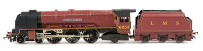 a toy train that is sitting on a white surface
