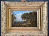 an oil painting of a landscape with trees on a easel