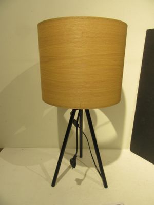a lamp that is on top of a table