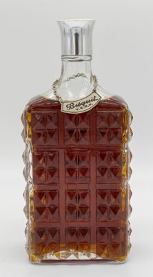 an image of a bottle of liquor sitting on a white surface