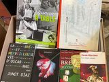 boxes of cookbooks and cookbooks are stacked on top of each other