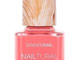 un flacon de vernis à ongles rose muni d'un bouchon en bois