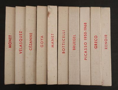 six livres portant des inscriptions rouges, posés sur une surface noire