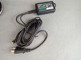 a picture of a charger that is plugged into a car charger