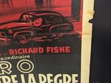 a poster on the door of a building advertising a movie