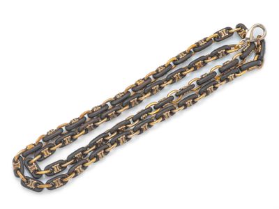 une paire de bracelets à maillons noirs et dorés sur fond blanc