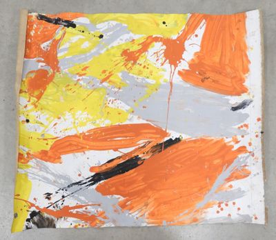 an orange and white painting on a piece of paper with paint splatters