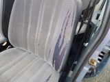 an image of a dirty seat in a car