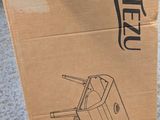 someone is holding a cardboard box with a drawing of a tank on it