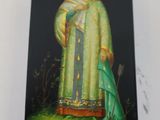 painting of a woman in a green dress holding a green umbrella
