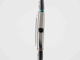 a close up of a black and silver toothbrush