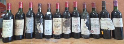 plusieurs bouteilles de vin alignées sur une table
