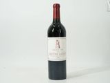 a bottle of wine that is sitting on a table
