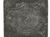an image of a black and white photo of a stone coaster