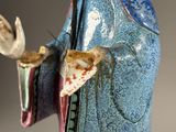 chinese figurine of a woman in a blue and pink outfit
