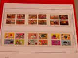 a picture of a collection of stamps in a red box