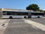 a bus that is parked on the side of the road
