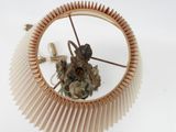 a picture of a mirror with a clock inside of it