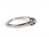 an image of a diamond ring on a white background