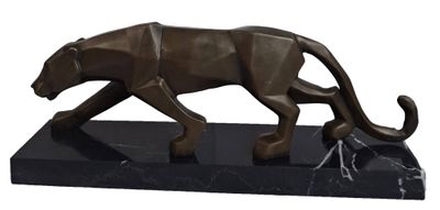 statue of a panther on a black marble base on a white background