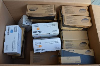 many boxes of electronic equipment sitting in a cardboard box