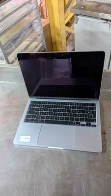a laptop that is sitting on the floor in the room