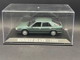 a close up of a green toy car in a clear box