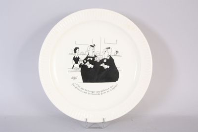 a white plate with a drawing of a group of people on it