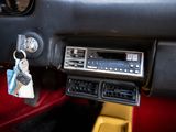 a car dashboard with a car key hanging from it ' s dashboard