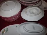 a lot of plates that are sitting on a table