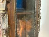 a mirror that is sitting on top of a table