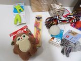 a stuffed animal sitting on a table next to other items