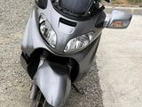 a motorcycle that is parked on the side of the road