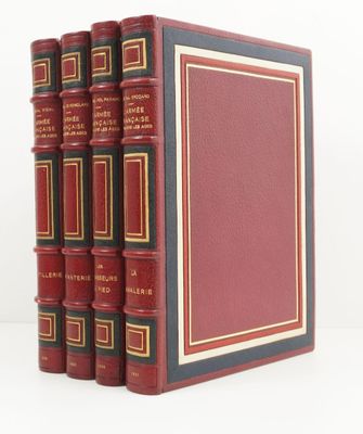 a set of five red books sitting on top of each other